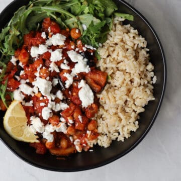 bowl of brown rice and harissa chickpea mix