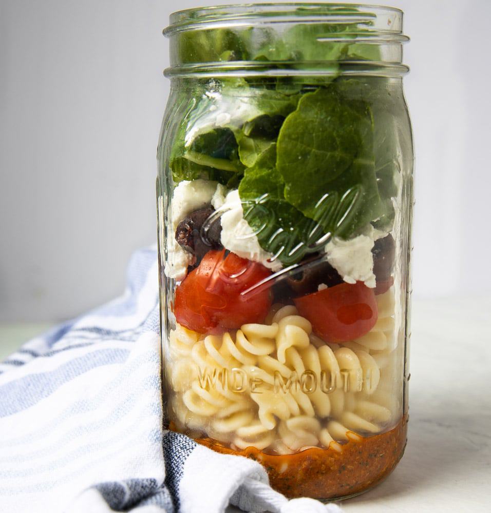 mason jar full of Romesco pasta salad