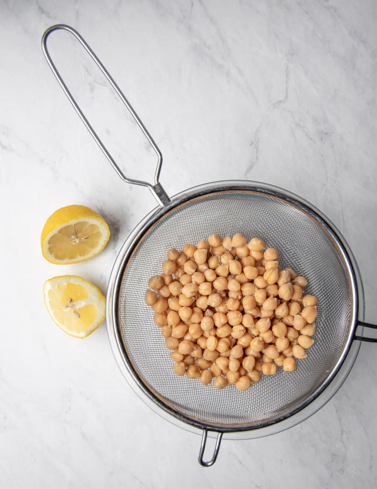 garbanzo beans in a colander