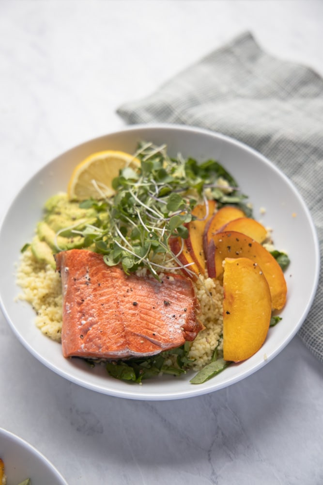 peach salmon bowl in a white bowl