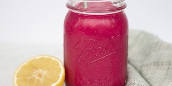 mason jar glass filled with beet smoothie