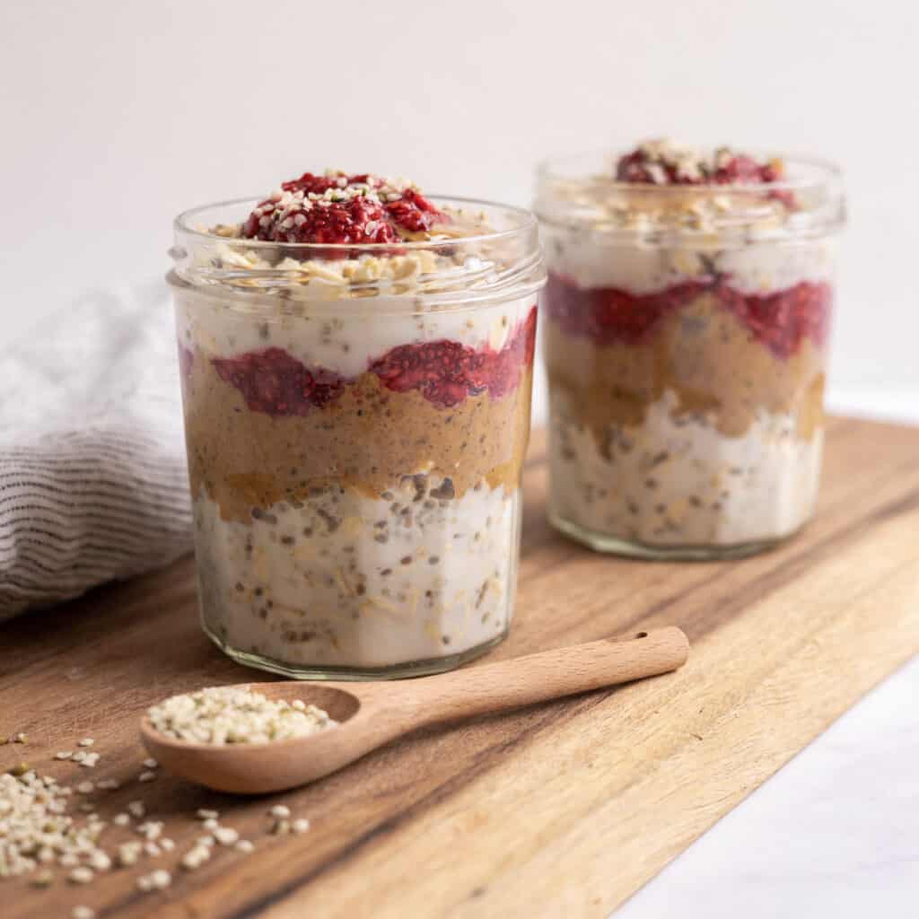 Quinoa overnight oats in mason jar with pb&j.