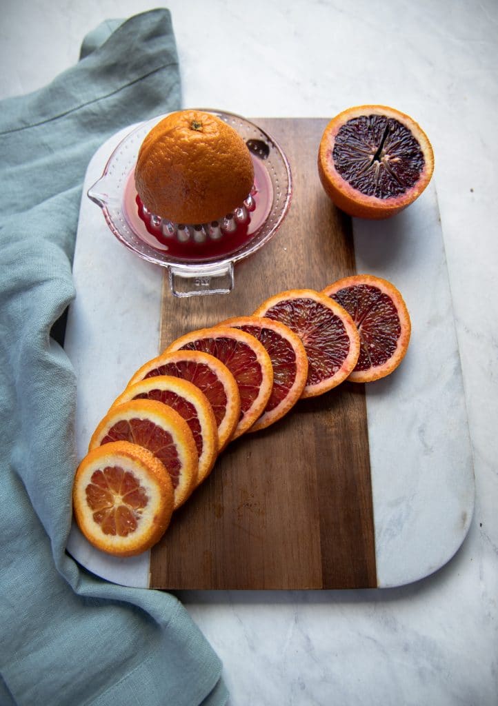cutting board with blood oranges 