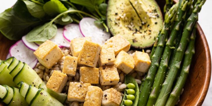 closeup image of grain bowl with ingredients layered