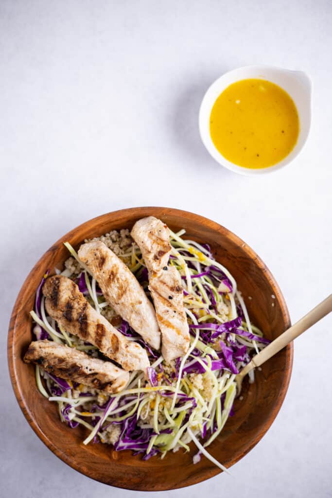 wooden bowl with lemongrass chicken quinoa bowl