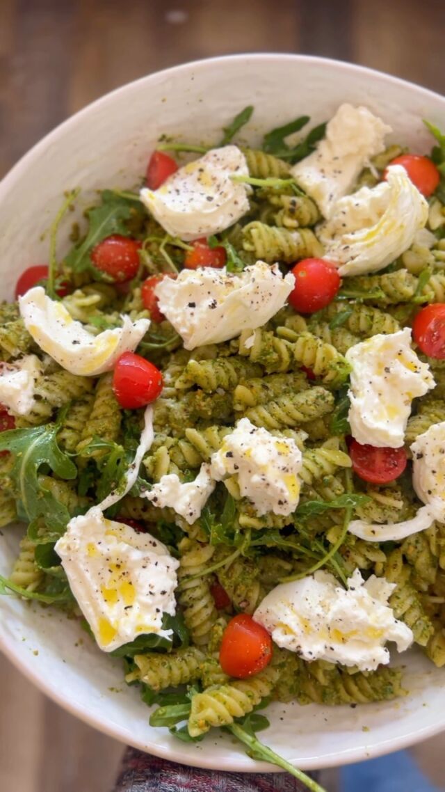 This is one of my go-to dishes to bring to any potluck so with graduations and end of the school year parties happening, I’ve been making this pasta salad with arugula pistashio pesto and burrata on repeat. 

I promise if you make this, it will get absolutely devoured.  This homemade pesto is so easy and packs tons of flavor and adding burrata is always a good idea!

Arugula Pistachio Pesto Pasta Salad
8 cups cooked pasta like rotini
1 cup cherry tomatoes, halved
2-3 balls of burrata torn into pieces
2 cups packed arugula
1 cup roasted pistachios 
2 cloves garlic, minced
1 Tbsp lemon zest
1/4 cup lemon juice (~2 lemons)
1/2 cup grated parmesan
pinch red pepper flakes
1/2 tsp flaky sea salt or 1/4 tsp kosher salt
1 cup spinach (if it’s too brown looking)
6T extra virgin olive oil

Arugula Pistachio Pesto Pasta Salad
8 cups cooked pasta like rotini
1 cup cherry tomatoes, halved
2-3 balls of burrata torn into pieces
2 cups packed arugula
1 cup roasted pistachios 
2 cloves garlic, minced
1 Tbsp lemon zest
1/4 cup lemon juice (~2 lemons)
1/2 cup grated parmesan
pinch red pepper flakes
1/2 tsp flaky sea salt or 1/4 tsp kosher salt
1 cup spinach
6T extra virgin olive oil

Combine the arugula, pustachios, garlic, lemon zest, lemon juice, parm, red peoper flakes, and salt in a food processor and pulse a few times to combine.  Drizzle in the olive oil with the motor running.  If it looks a little brown from the pistachios you can add a cup of spinach and blend until smooth-ish.  Toss with your cooked pasta and cherry tomatoes. Top with torn burrata and extra arugula. Drizzle with evoo and top with cracked black pepper and flaky salt.

#pastasalad #potluck #summersalad #pesto #arugula #pistachio #pestopasta #pastaporn #burrata #summerdinner #entertaining #bbqdish #sidedishrecipe #sidedish
