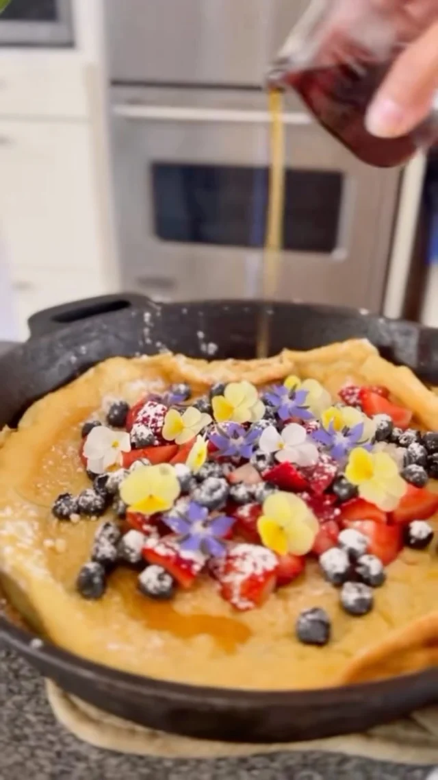 It looks fancy, but it’s secretly the easiest brunch ever 😏. Just let the blender do all the work for you! 
This Dutch Baby pancake makes magic in the oven and puffs up like a dream—just top with fresh berries and some edible flowers for major wow factor 🍽️✨

Sign up for my weekly newsletter and you’ll get a free download of my summer cookbook where you can find this full Dutch baby recipe!
#FancyWithoutTheFuss #Effortlessentertaining #DutchBaby #Brunchgoals #brunchrecipe #castironcooking #breakfastrecipes #prettyfoodtastesbetter