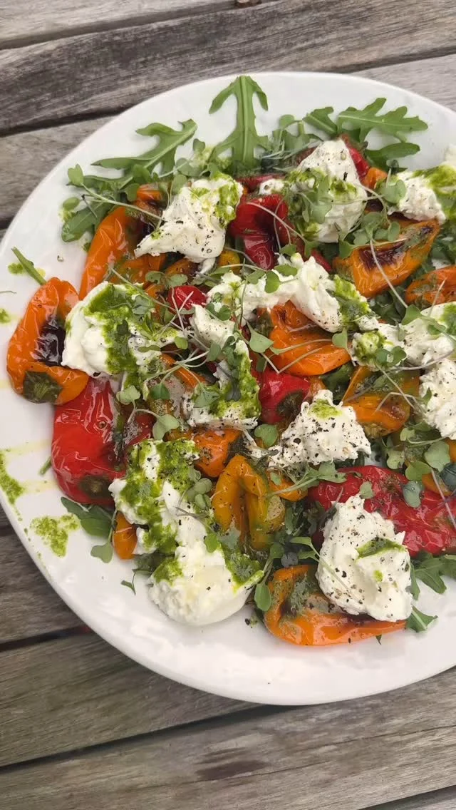 Save this recipe for your Memorial Day cookout! Roasted baby bell peppers with creamy burrata and a zippy lemon basil vinaigrette is such an easy appetizer to assemble but packs some serious wow factor.  It’s the ultimate fancy without the fuss side dish! 

Roasted Bell Pepper and Burrata Salad

1 large bag of baby bell peppers (~1.5lbs)
2 tbsp olive oil
1/2 teaspoon salt and pepper

Roast at 425 for roughly 20-30 minutes or until deeply colored in spots and softened

Lemon Basil Vinaigrette
* 2 cup fresh basil
* 1 whole lemon, zested and juiced
* 2 whole garlic cloves
* 1 teaspoon kosher salt
* ¼ teaspoon black pepper
* 2 tablespoon red wine vinegar
* ½ cup extra virgin olive oil

Combine the fresh basil, lemon zest, lemon juice, garlic cloves, salt and pepper into a food processor or blender.  Pulse thoroughly to combine.

On a platter, scatter a few handfuls of arugula and drizzle with the lemon basil vinaigrette.  Top with the roasted peppers.  Tear about chunks of burrata and dollop on top of the peppers.  Drizzle with more lemon basil vinaigrette.  Sprinkle with sea salt, cracked black pepper and optional micro greens.

#burratacheese #sidedish #sidedishes #memorialdaybbq #potluckfood #easysalad #prettyfood #saladrecipes #saladrecipe #eatwithyoureyes #fancywithoutthefuss
